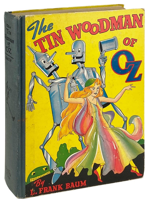 Item #26931 The Tin Woodman of Oz: A Faithful Story of the Astonishing Adventure Undertaken by the Tin Woodman, Assisted by Woot the Wanderer, the Scarecrow of Oz, and Polychrome, the Rainbow's Daughter. L. Frank Baum, John R. Neill.